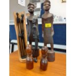A collection of African treen figures Location: stairs