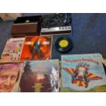 A vintage RGD record player A/F, together with a small quantity of records to include Tom Jones