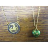 A yellow metal guilloche, green enamelled, heart shaped pendant set with a brilliant cut diamond