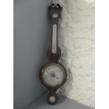 A 19th century mahogany barometer having a broken swan neck pediment and silvered dials, 96"h