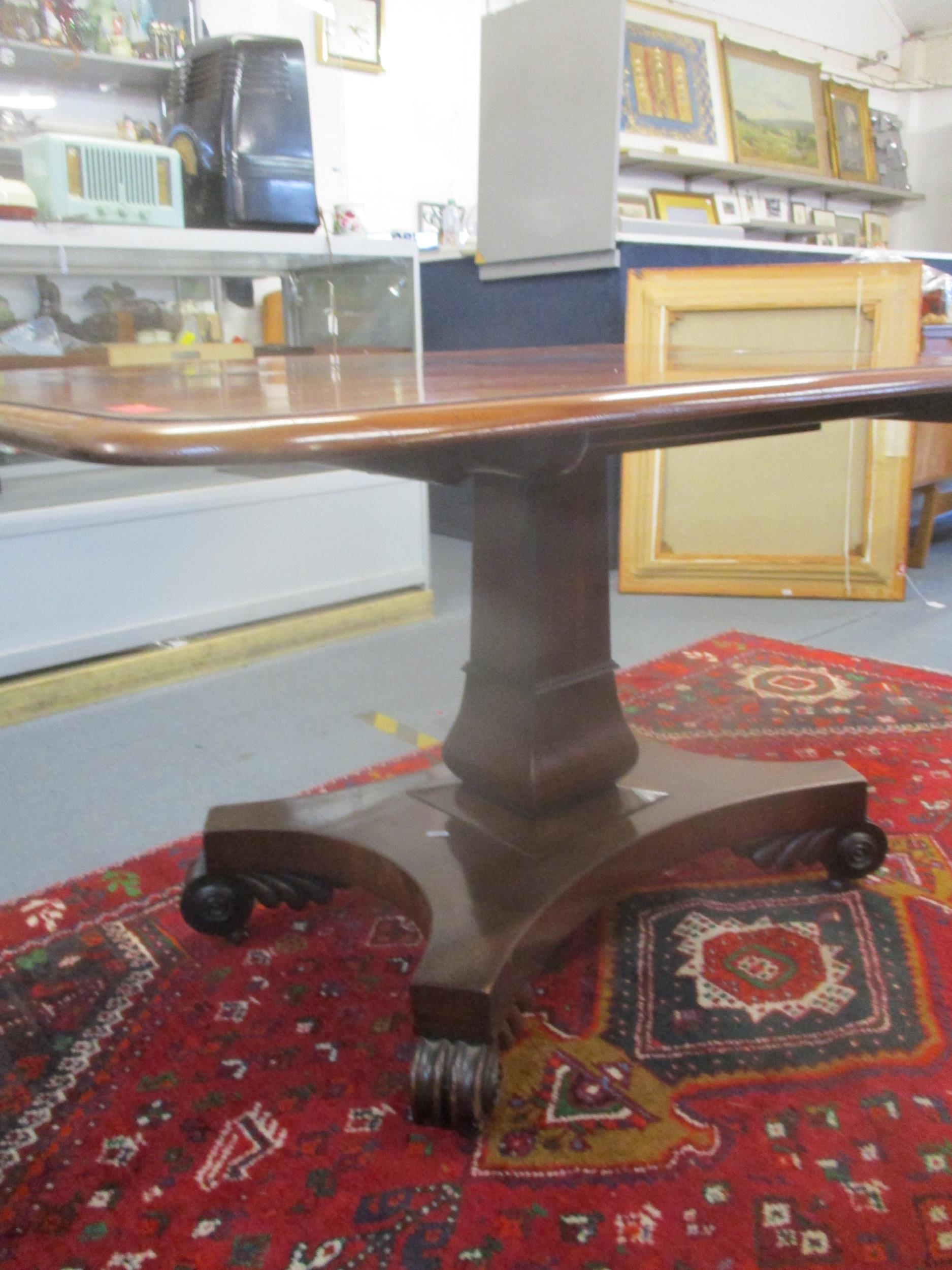 A Regency mahogany tilt top breakfast table, the rectangular top with rounded corners and moulded - Image 3 of 3