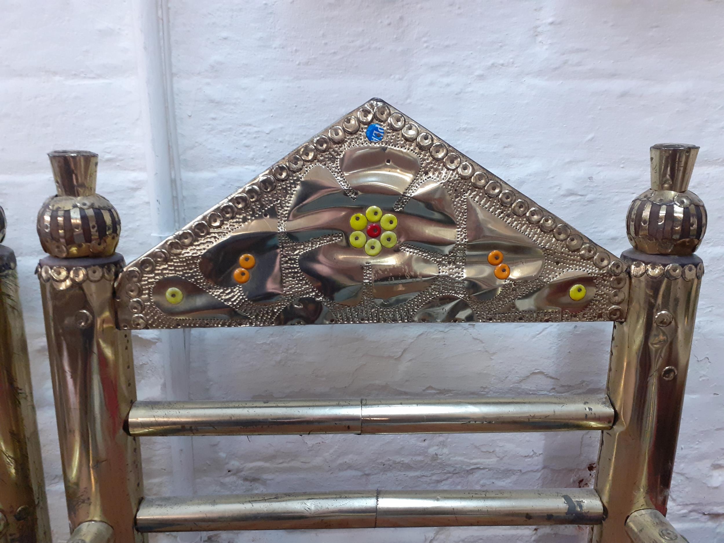 A pair of Middle Eastern inspired brass clad ornate open armchairs with strapwork seats - Image 2 of 4
