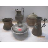 A group of Middle Eastern copperware to include covered bowls and a jug Location: 10:5