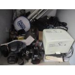 A selection of cameras and accessories to include a Nikon Coolpix 5700, Nikon Coolpix 990 and others