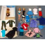 A 1960's Barbie doll case containing a 1960's Barbie and Midge, clothing comprising Sindy, Paul,