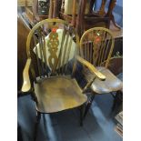Two Windsor wheelback elm seated chairs Location: