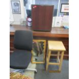 An Electrolux counter fridge, a Sedus Early Bird swivel chair, a birchwood bar stool and a cane