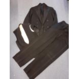 Vintage gents black tails, waistcoat and trousers Location: SR