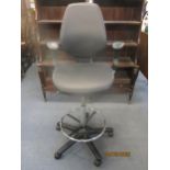 An executive draughtsman swivel office chair Location: A1F