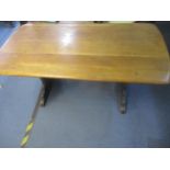 Ercol Golden Dawn refectory dining table, 74cm x 153cm x 77cm Location: