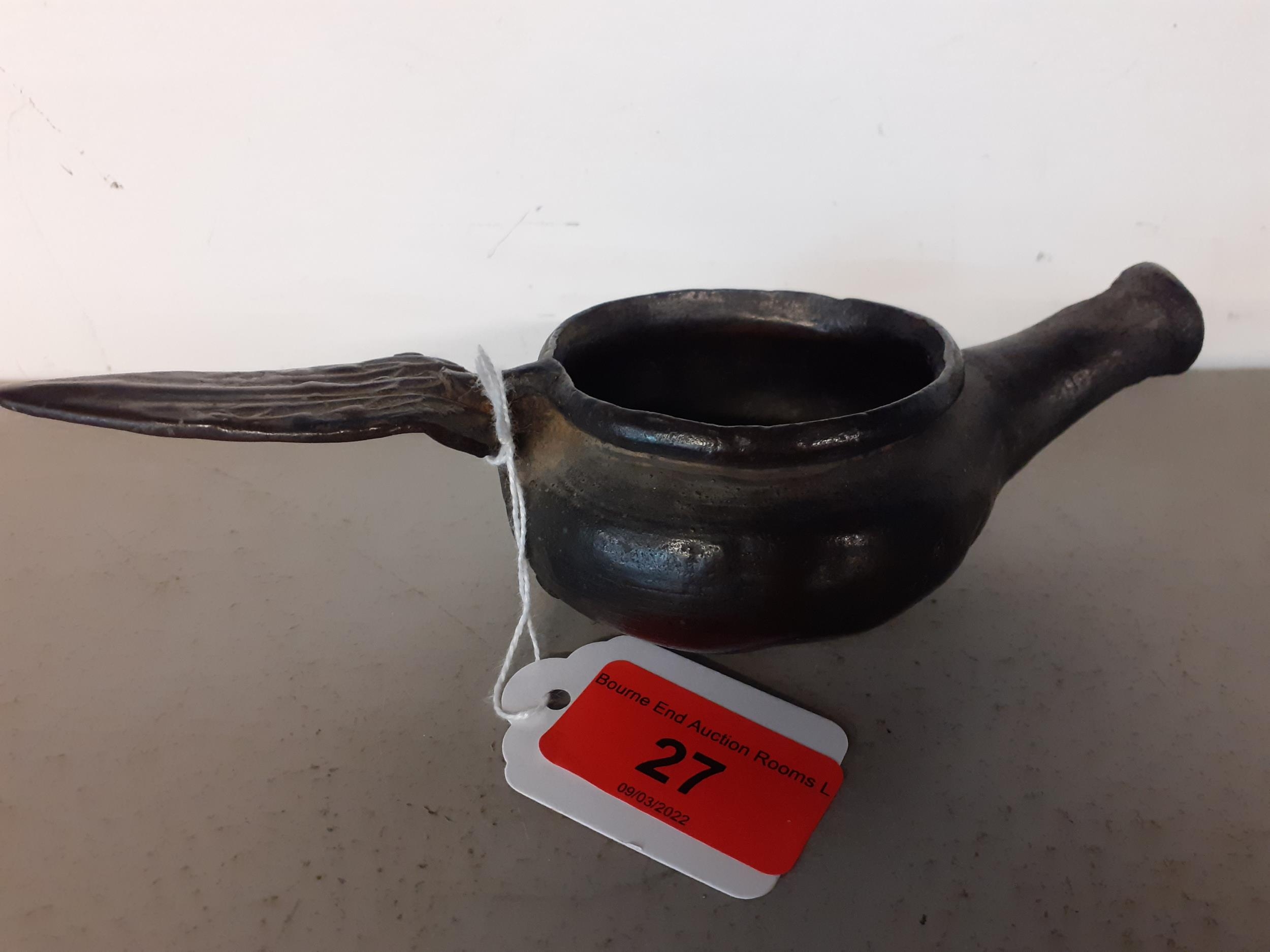 An antique panted bronzed oil burner lamp A/F Condition: small crack to handle Location: