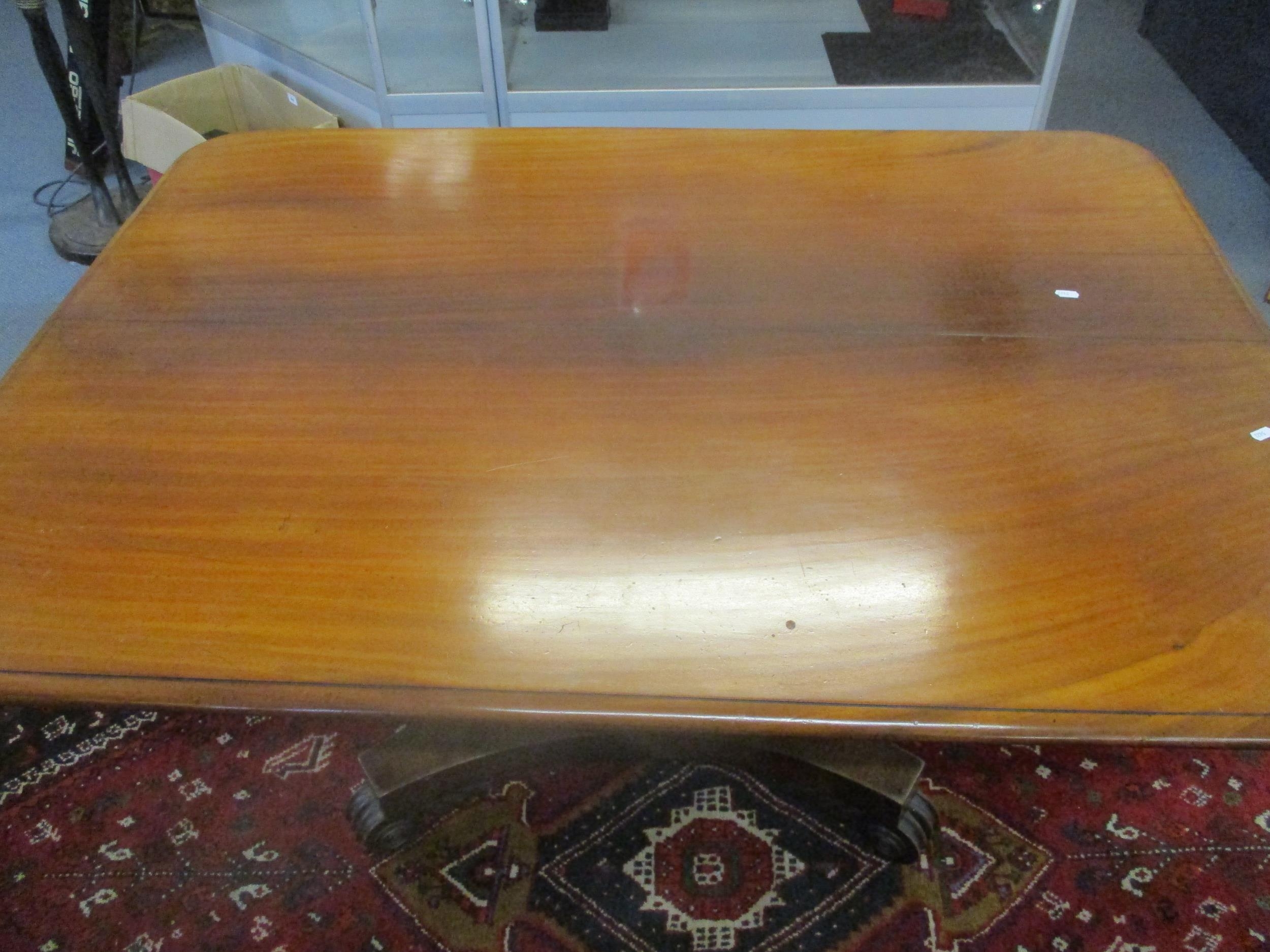 A Regency mahogany tilt top breakfast table, the rectangular top with rounded corners and moulded - Image 2 of 3