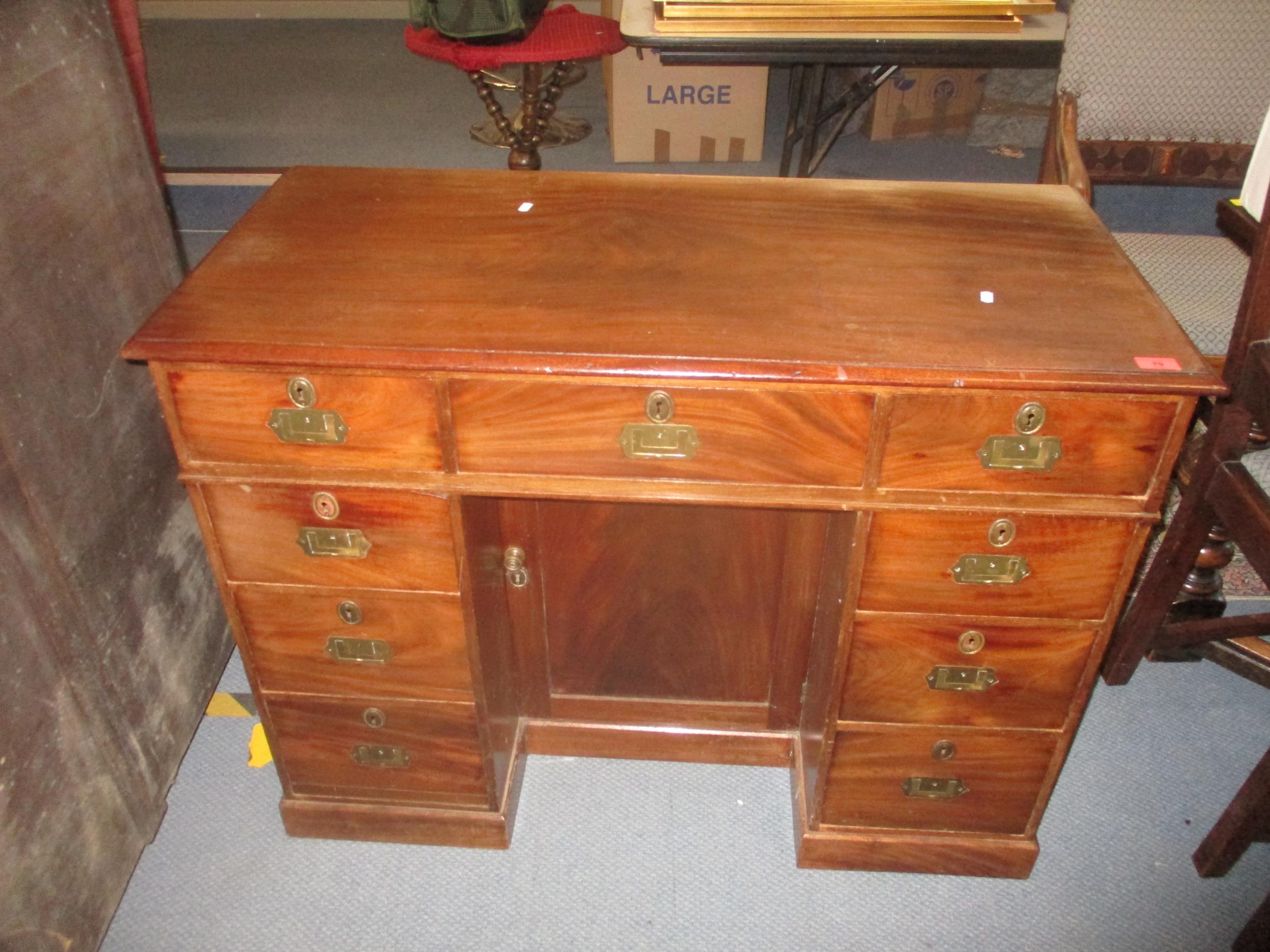 An Edwardian mahogany kneehole writing desk with inset brass handles, fielded cupboard door, one - Image 2 of 2