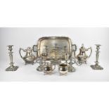 A collection of silver plated wares to include a large Oneida twin handled tray with scrolled border