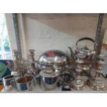 A quantity of silver plated table ware to include a muffin dish, an entrée dish, a coffee pot and