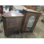 Two oak wall hanging corner cabinets to include a Georgian cabinet having an arched top glazed