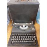 An Imperial Good Companion Model T typewriter, in a case Location: 1:3