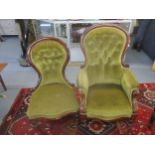 A Victorian mahogany upholstered his and her chair, upholstered in green button back fabric, on