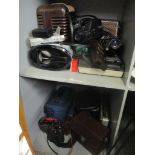A mixed lot of electrical items to include cameras, lenses, binoculars and radios