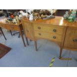 A mahogany Edwardian style sideboard with matching two drawer side table, each having stringing