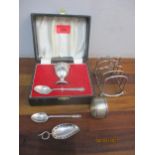 A group of silver items to include a George V silver toast rack, Chester 1912 mark for Haseler