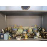 A selection of resin and porcelain ornaments to include Brambly Hedge figurines and a trinket box,