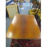 A Regency mahogany tilt top breakfast table, the rectangular top with rounded corners and moulded