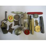 Collectables to include military cap badges, St John's Ambulance related items, a silver plated