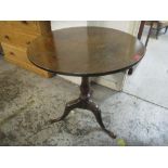 A Georgian oak circular topped snap top occasional table, 70cm h x 72.5cm w and a Victorian oak