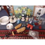 A miscellaneous lot to include a reproduction Uncle Sam metal money box, treen shoe stays, a