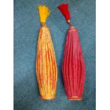 Two 1970's Chinese cloth lanterns in red and orange with lacquered treen base and tassels