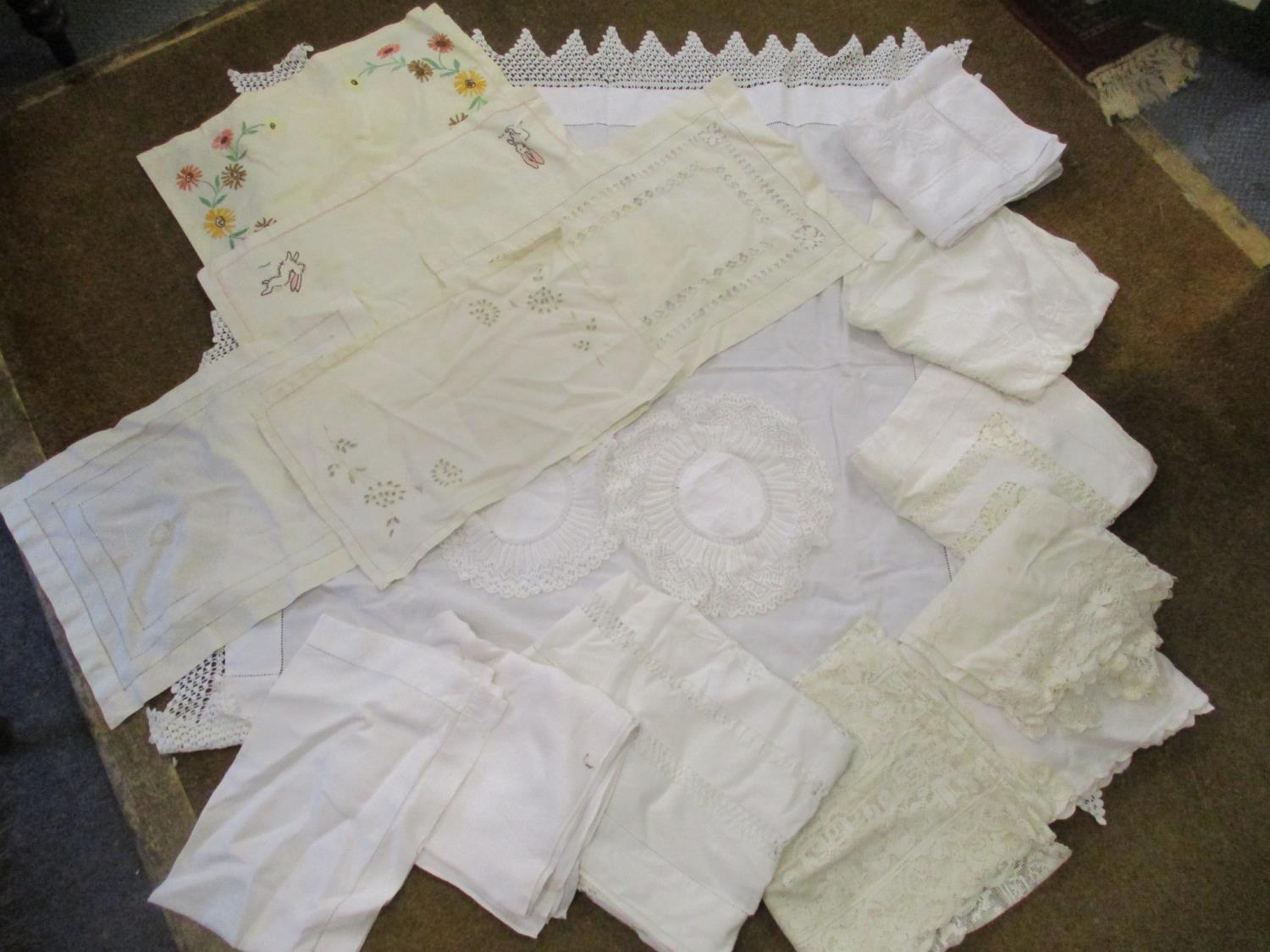 Eight Victorian and Edwardian white cotton table cloths in square form with machine made
