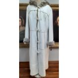 John Rocha-A cream sheepskin full-length coat with faux fur lining, hood and 5 bone effect