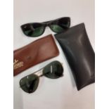 Rayban- Two pairs of vintage sunglasses comprising one black plastic Model 9825B and one metal