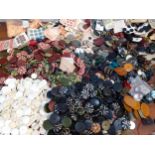 Vintage buttons to include Art Deco paper mache buttons in blues, reds, greens and browns, a large