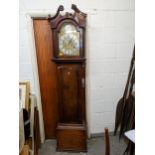 A George III mahogany longcase clock, with an eight day bell strike movement, silvered chapter