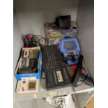 Vintage electronic games to include a Tomy Space Turbo, a ZX Spectrum 2, a Game Boy and