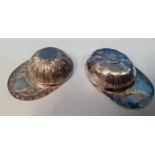 Two silver jockey hat tea caddy spoons, 21.5g, sold by Silver Direct Location: Porters