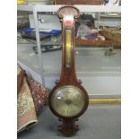 A Victorian mahogany barometer having a scroll case and a silvered dial 102cm h x 31.5cm w A/F,