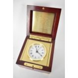 A Tiffany & Co presentation clock, having a white enamel dial with Roman numerals and central