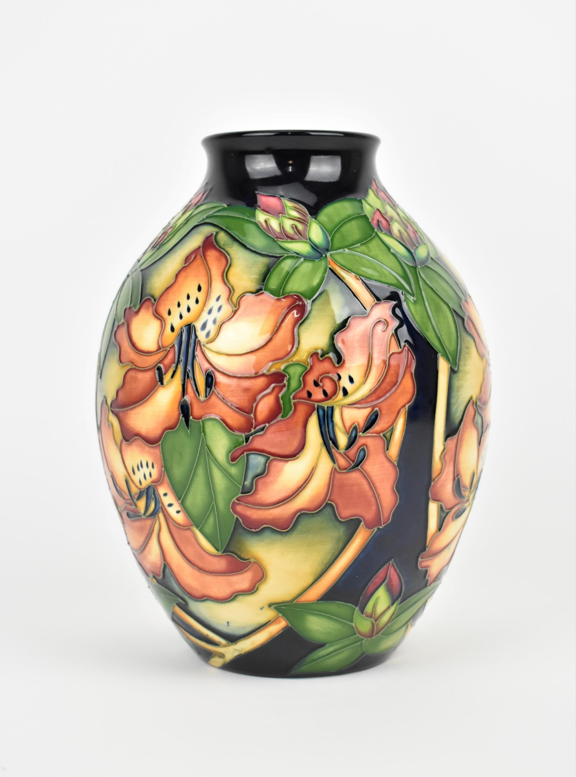 A Moorcroft ceramic vase in the Amberslade pattern from the New Forest collection designed by Rachel