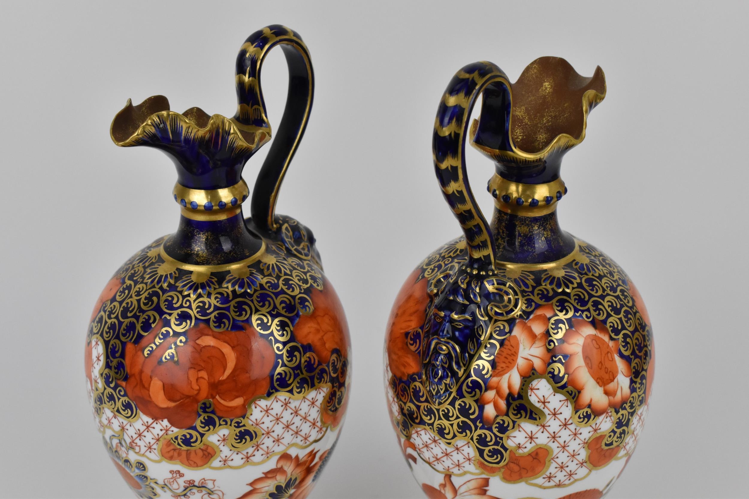 A pair of Royal Crown Derby ewers in the imari pattern, shape no. 350, with ovoid bodies, frill rim, - Image 3 of 5