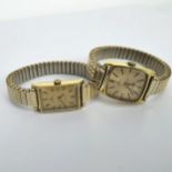 A pair of vintage ladies gold plated Omega wristwatches to include an Omega Ladymatic with baton