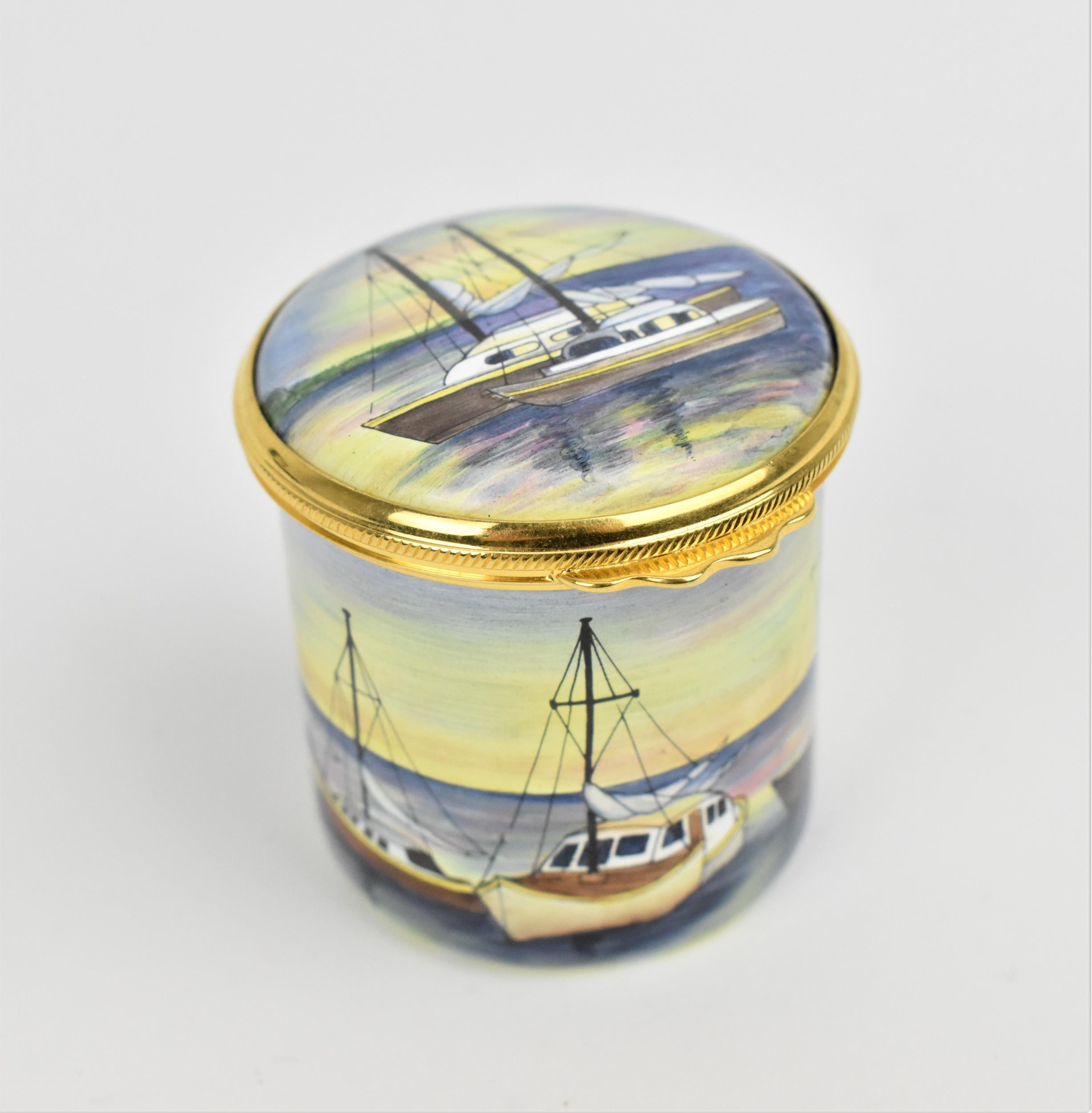 A Moorcroft Enamels Ltd box with hinged lid, the nautical pattern with boats in a harbour,