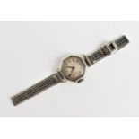 An early 20th century ladies 18ct white gold cased manual wind wristwatch having Arabic numerals and