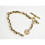 A 9ct gold watch chain having a T-bar and dog clip with attached masonic fob, 12.20g