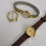 A group of three gold plated ladies Longines wristwatches to include two manual wind examples having