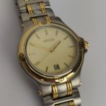 A gents stainless steel Gucci quartz wristwatch having a cream dial with gilt baton hour markers,