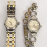 A pair of ladies stainless steel Omega Ladymatic wristwatches, one having a silvered dial with