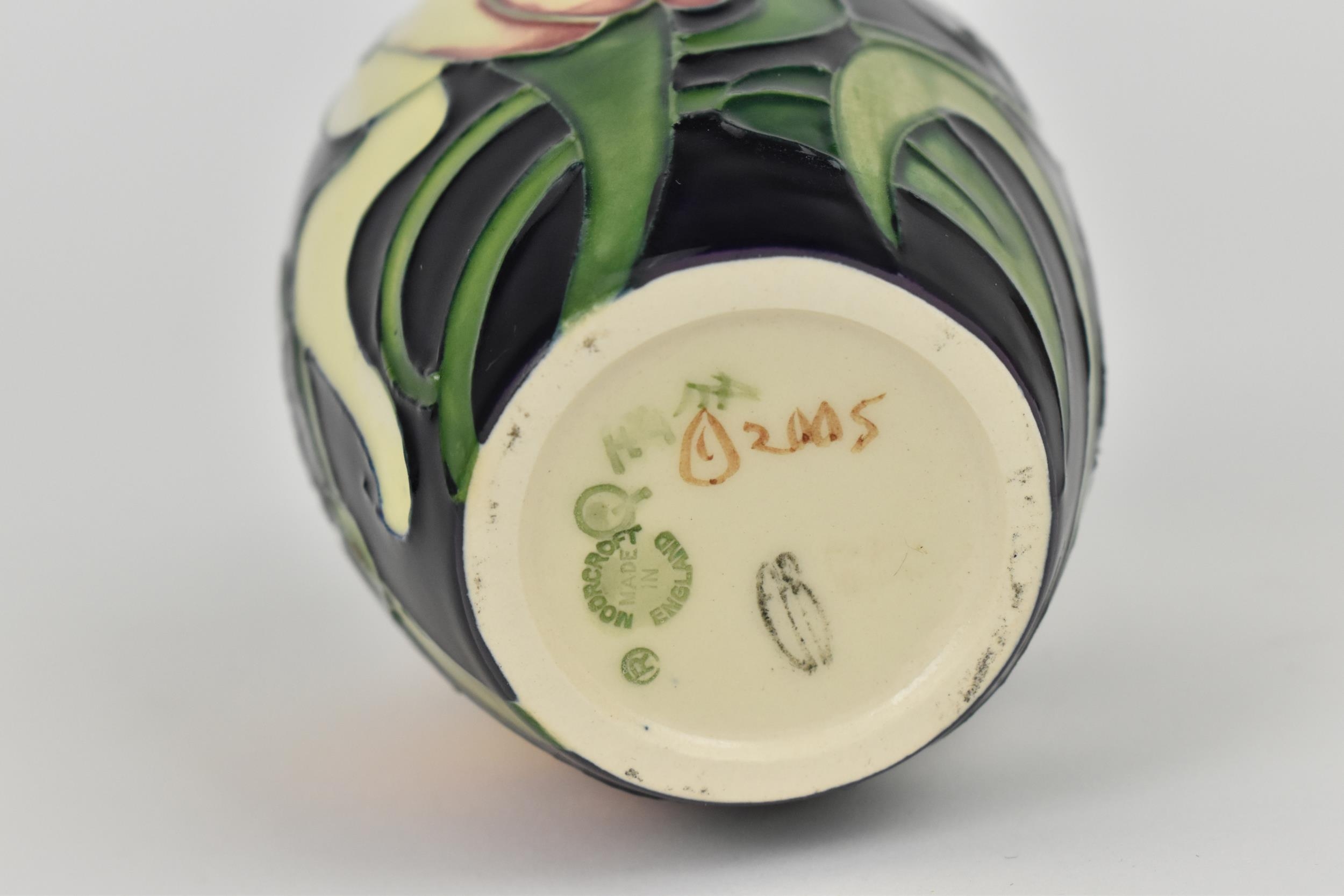 A Moorcroft ceramic vase by Emma Bossons in the 'Miss Alice' pattern, 2005, with signatures and - Image 3 of 4